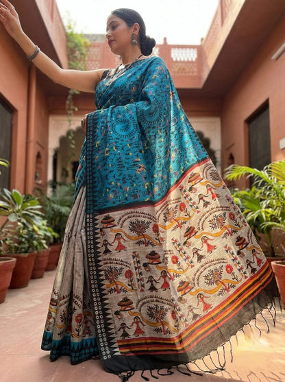 Celebrate timeless Indian artistry with this stunning&nbsp;Peacock Blue Madhubani Print Saree.