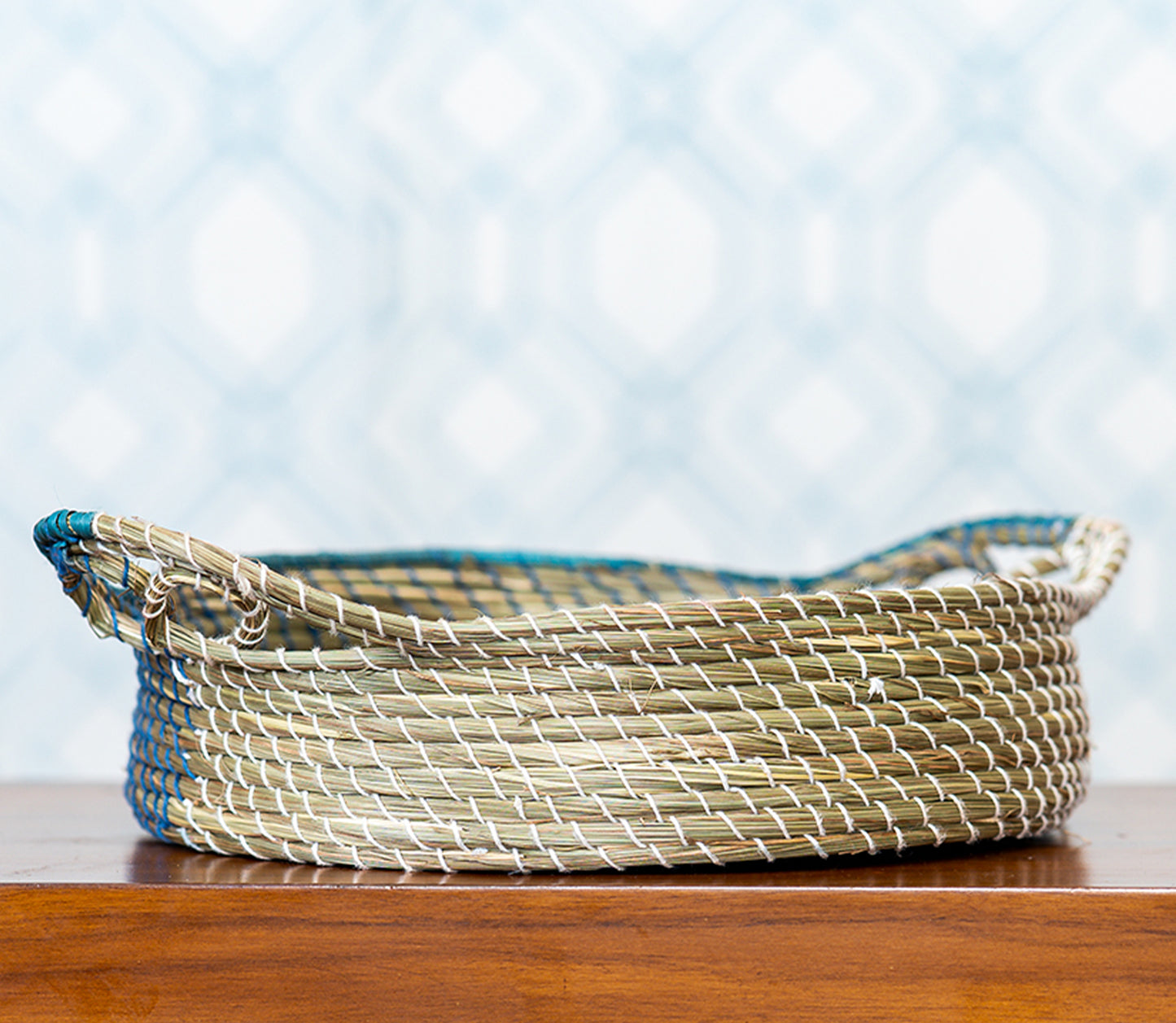 Round Basket of Sabai Grass with Blue and White Thread Work - ArtisanSoul